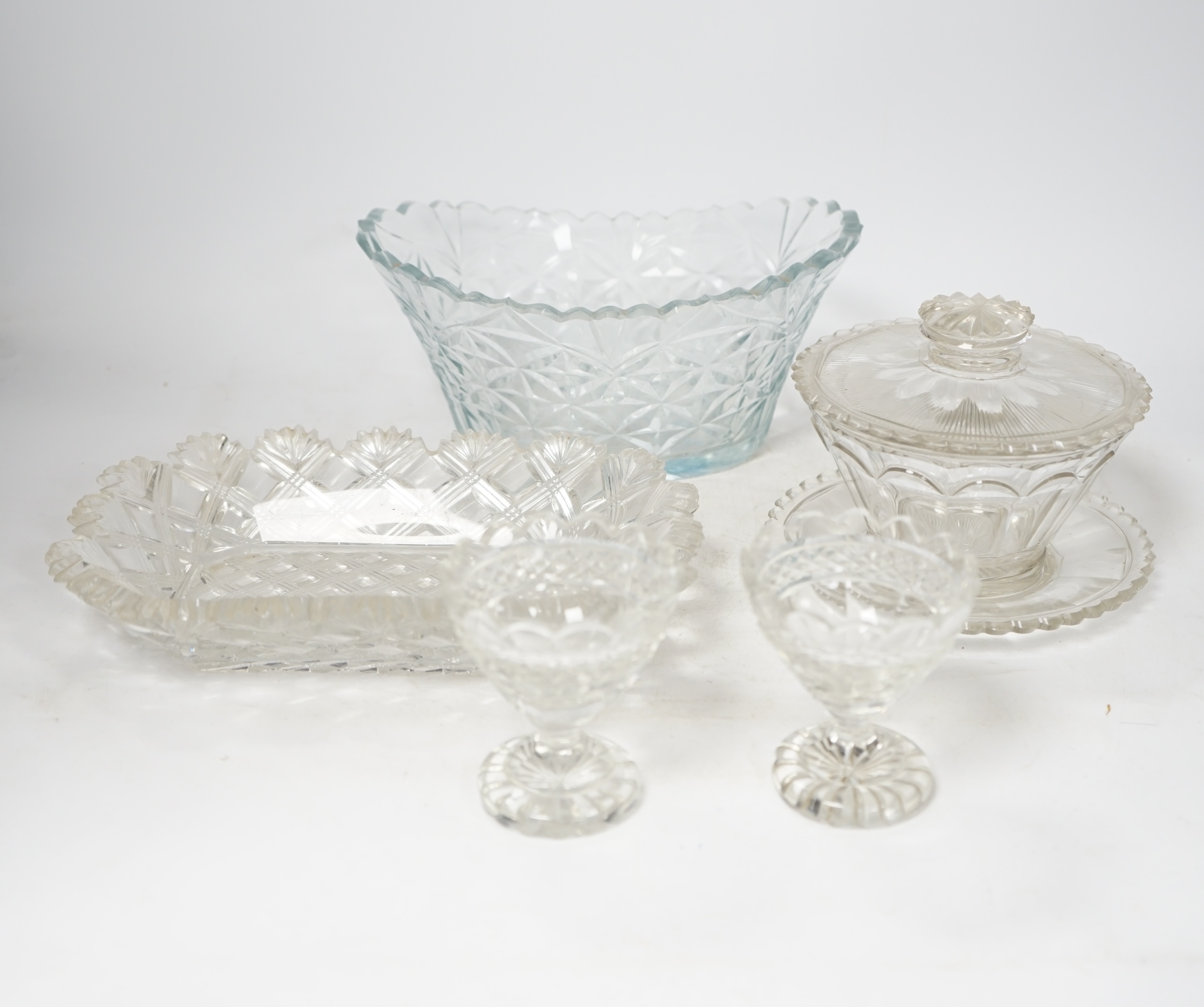 Six pieces of 19th century cut glass including a bon bon dish and a pair of glasses, largest 23cm. Condition - poor to fair, some chips